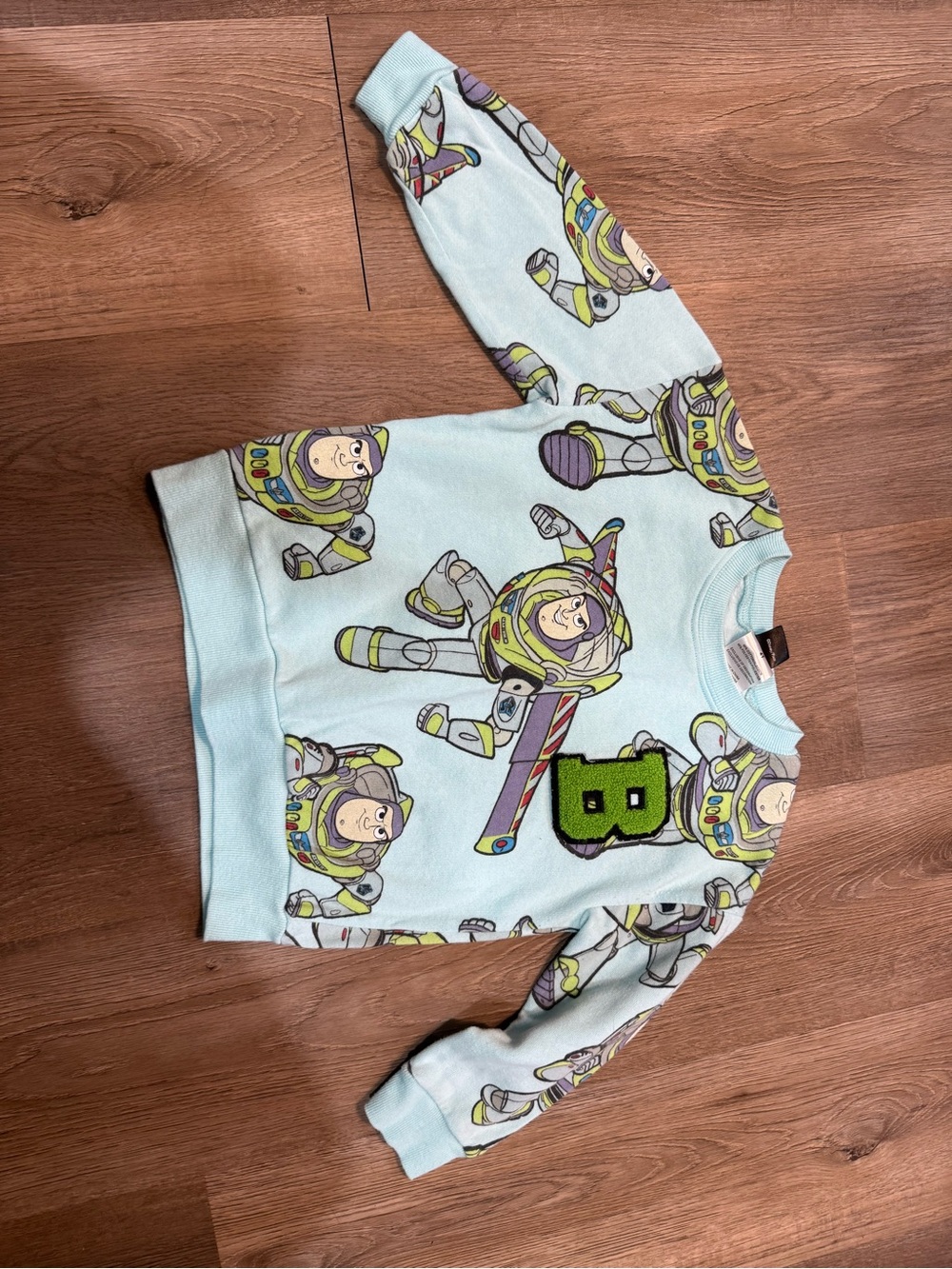 Disney Light Blue Buzz Lightyear Crewneck Sweatshirt with Green Patch